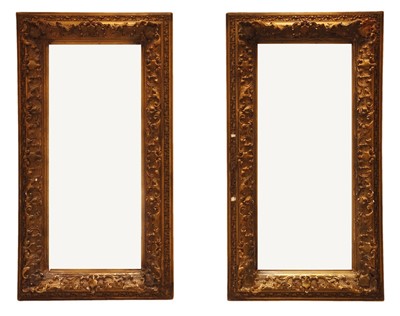Lot 99 - A pair of carved giltwood and gesso wall mirrors