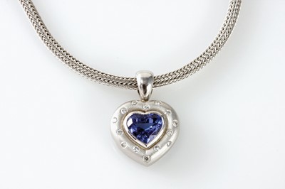 Lot 15 - 18ct white gold tanzanite and diamond heart-shaped pendant