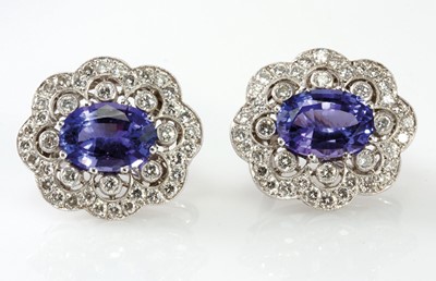 Lot 4 - 18ct white gold pair of ‘scalloped’ edge oval shape tanzanite and diamond stud earrings
