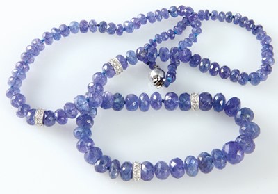 Lot 5 - Single strand faceted ‘rondelle’ bead tanzanite and diamond necklace