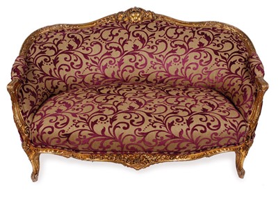 Lot 62 - A Louis XV style giltwood and upholstered settee, 20th Century