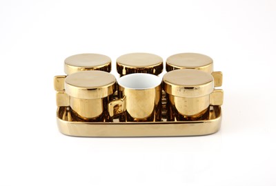 Lot 127 - A set of six gold ceramic espresso cups