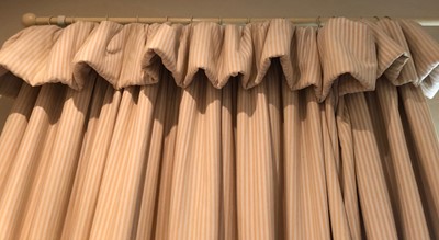 Lot 183 - A pair of striped curtains with eyelets