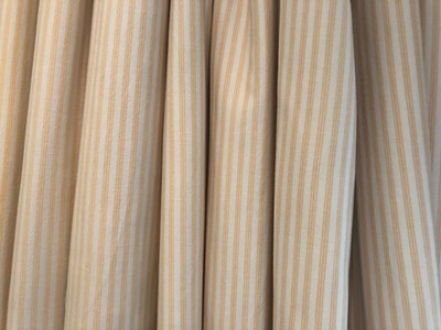 Lot 183 - A pair of striped curtains with eyelets