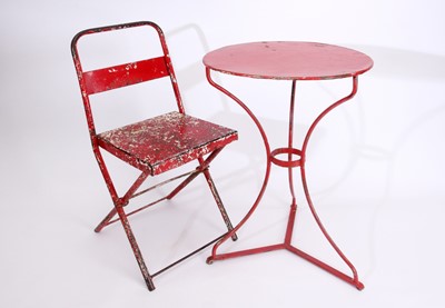 Lot 37 - A red painted metal pub table and chair
