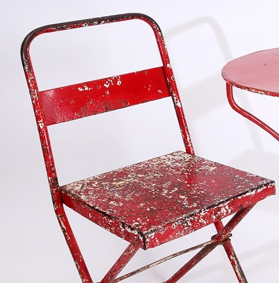 Lot 37 - A red painted metal pub table and chair