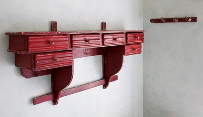 Lot 64 - A red-painted wooden hanging shelf and a peg rail