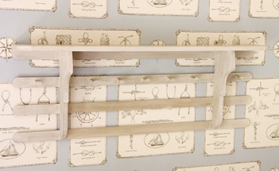 Lot 65 - A white-painted wood hanging shelf