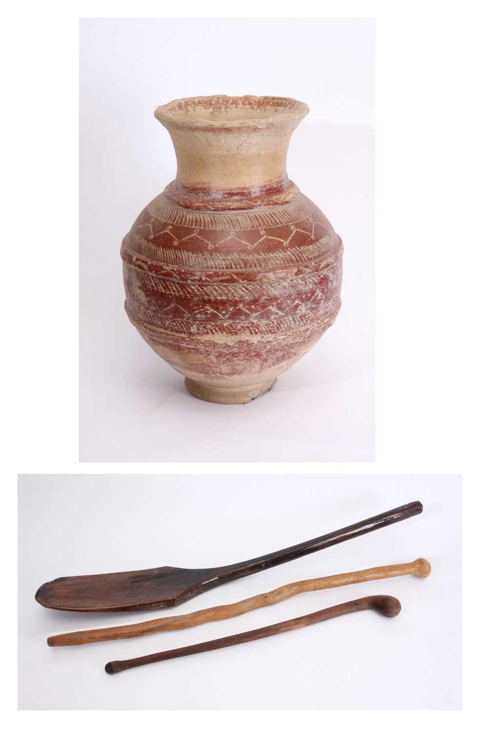 Lot 81 - An earthenware vessel, two wooden 'knopkieries' and a wooden oar