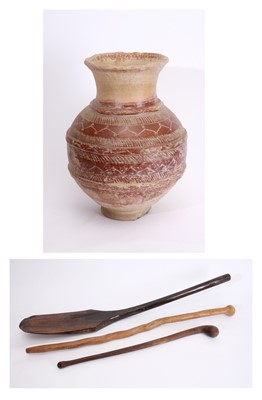 Lot 81 - An earthenware vessel, two wooden 'knopkieries' and a wooden oar