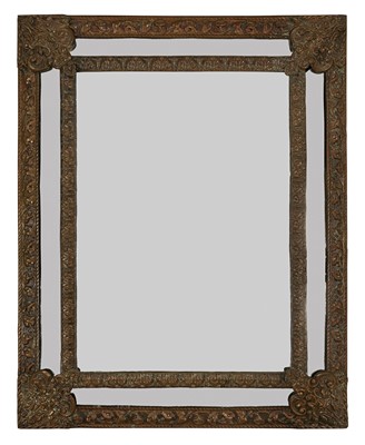Lot 86 - A continental tin clad wall mirror