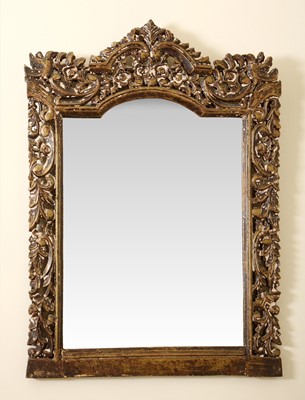Lot 87 - A carved wood and parcel gilt wall mirror