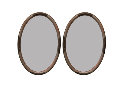 Lot 88 - A pair of gilt oval mirrors