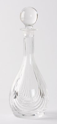 Lot 12 - ,A modern clear glass ovoid decanter with long neck, cut with bands of swirls and clear glass globular stopper and another similarly decorated mallat-shaped with clear glass drum stopper