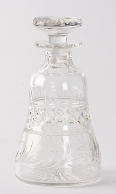 Lot 16 - ,A modern mallat shaped clear glass decanter with lattice and foliate bands, a mushroom stopper with star cutting and star cut base