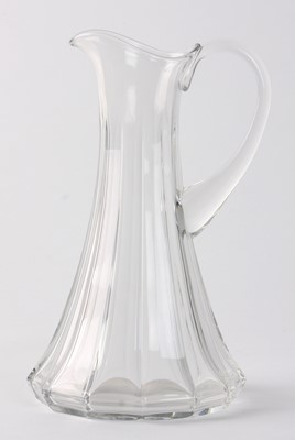 Lot 18 - ,A clear glass pitcher with overall fluting