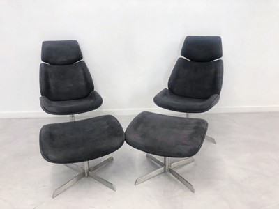 Lot 267 - ,A pair of modern grey armless lounge accent chairs with matching ottomans