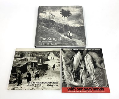 Lot 50 - , 'South Africa: The Cordoned Heart' by Omar Badsha, and six others